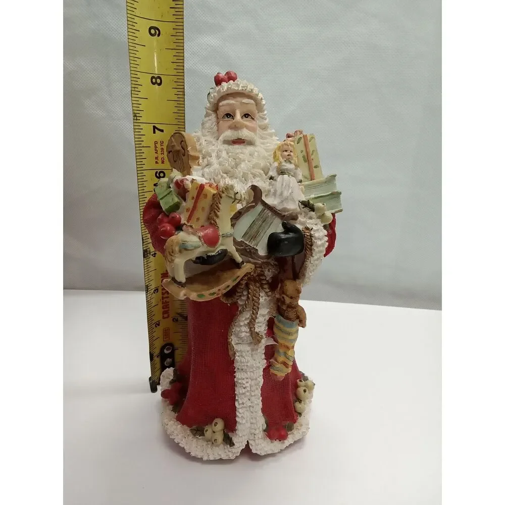 Santa Figurine  ceramic‎ holding gifts appox 9x5x5